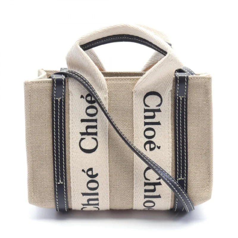 Shoulder bags with compact designs for portability -Chloe Woody Mini Canvas Leather Shoulder Bag