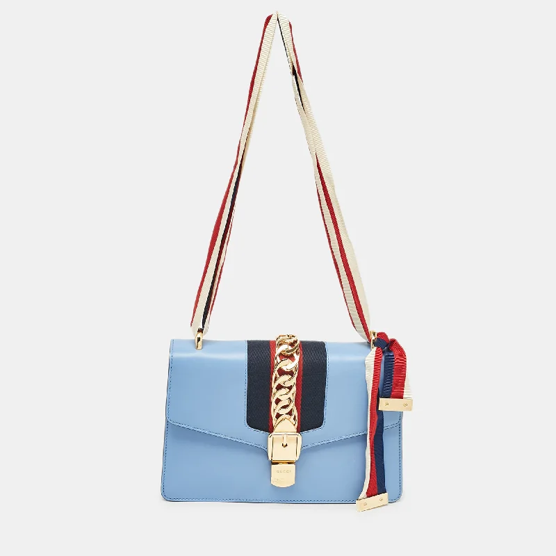 Shoulder bags with minimalist sleek silhouettes -Gucci Light Blue Leather Small Web Sylvie Shoulder Bag