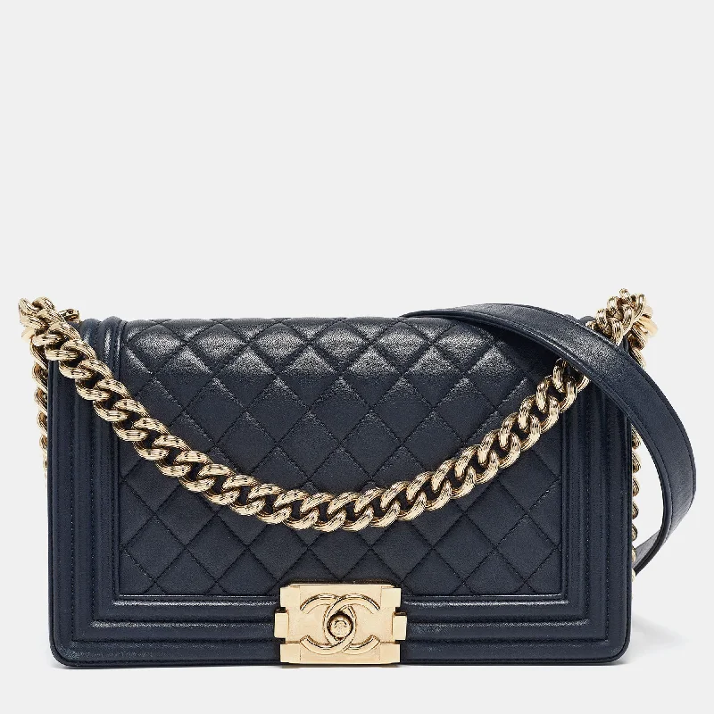 Shoulder bags with vintage vibes for nostalgia -Chanel Navy Blue Quilted Leather Medium Boy Flap Bag