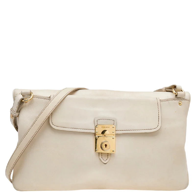 Shoulder bags with eco-friendly bamboo accents -Miu Miu Cream Leather Fold Over Shoulder Bag