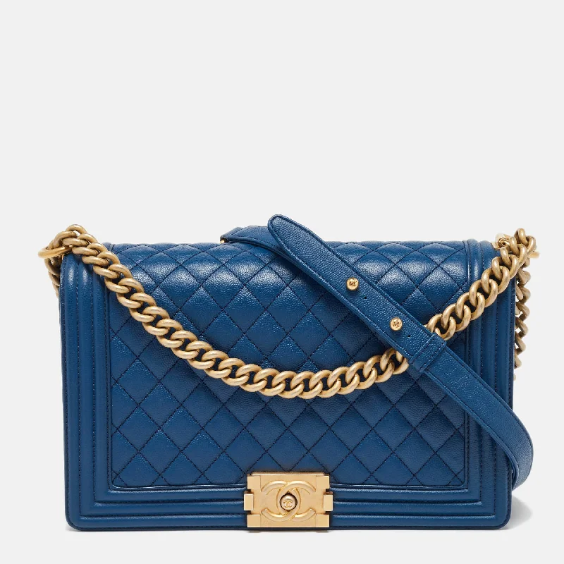 Shoulder bags with playful patterns for fun -Chanel Blue Quilted Caviar Leather New Medium Boy Flap Bag