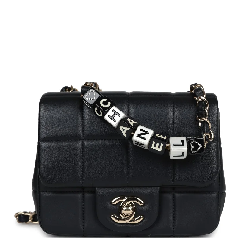 Small handle bags perfect for quick trips -Pre-owned Chanel Monaco Mini Square Flap Bag Black Lambskin Light Gold Hardware