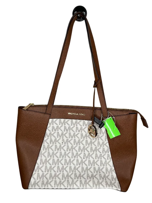 Handle bags with compact designs for portability -Handbag Designer By Michael Kors, Size: Large