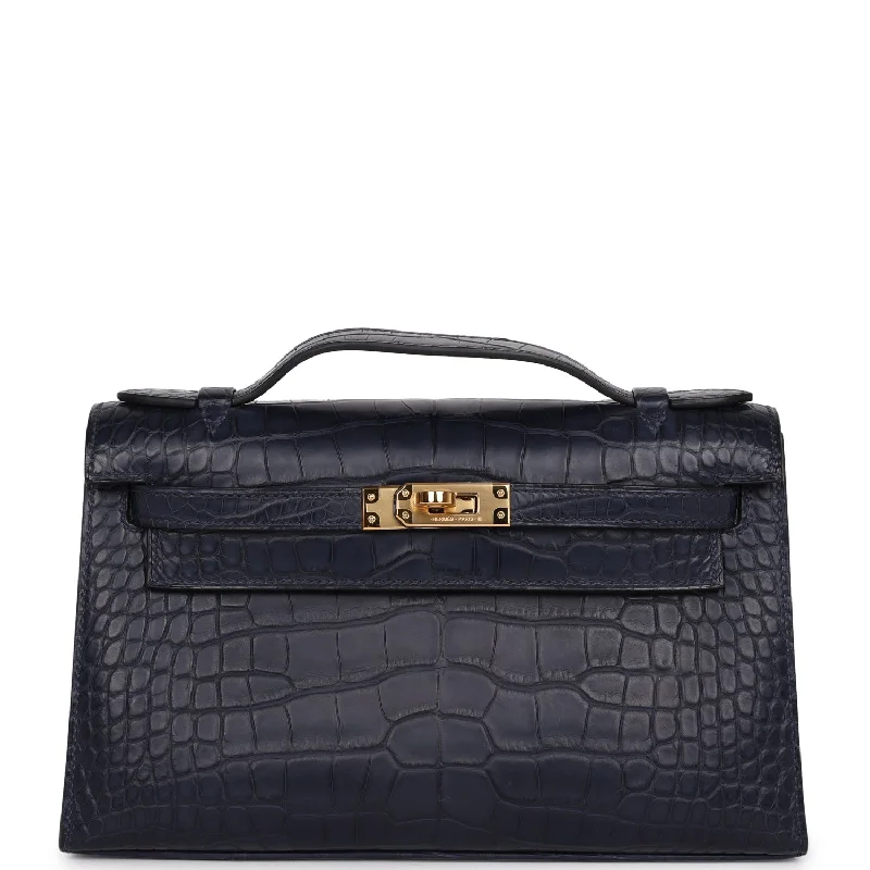 Handle bags with sleek zippers for closure -Hermes Kelly Pochette Bleu Indigo Matte Alligator Gold Hardware