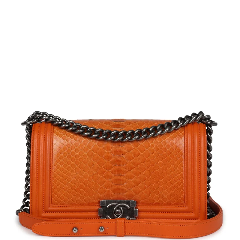 Handle bags with bright florals for cheer -Pre-owned Chanel Medium Boy Bag Orange Python Aged Ruthenium Hardware