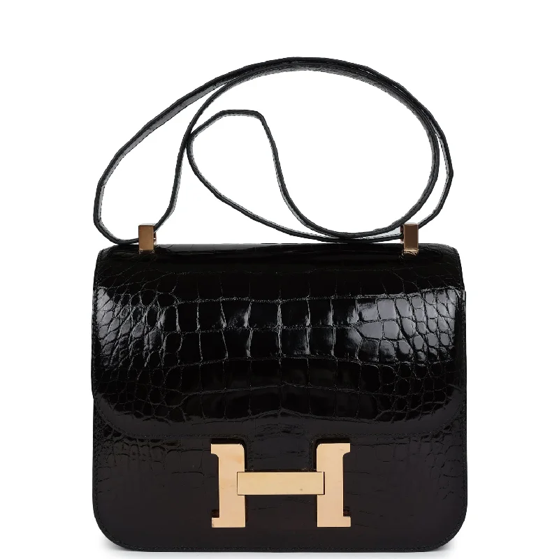 Handle bags with inner compartments for essentials -Pre-owned Hermes Constance 24 Black Shiny Alligator Rose Gold Hardware