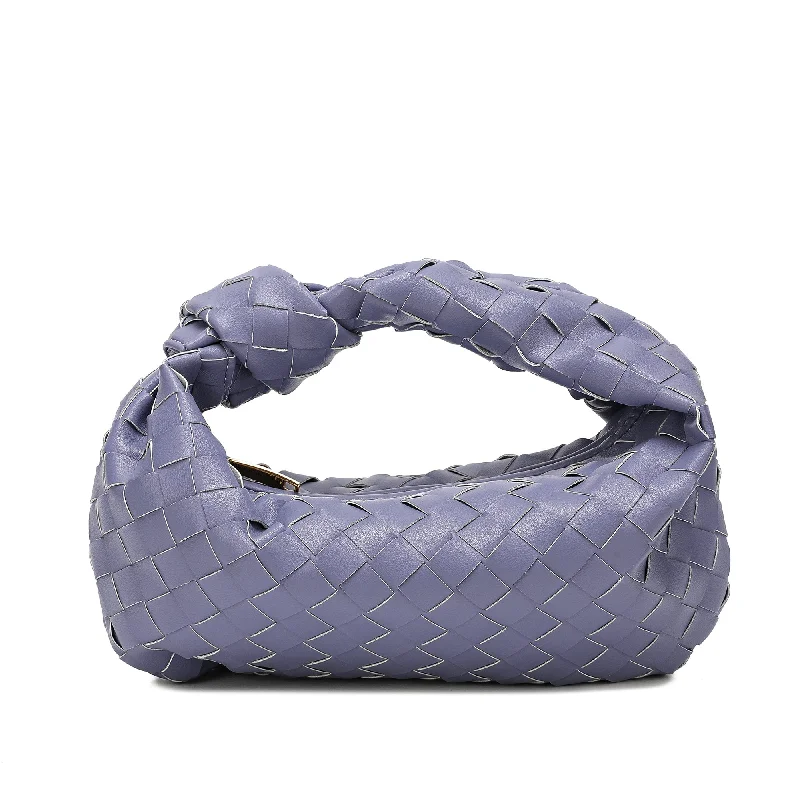 Handle bags with inner compartments for essentials -Tiffany & Fred Woven Sheepskin Knot Pouch Bag