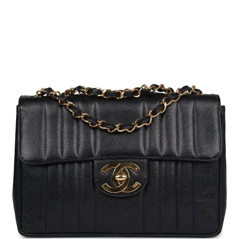 Handle bags with vibrant colors for boldness -Vintage Chanel XL Jumbo Mademoiselle Vertical Flap Black Caviar Gold Hardware